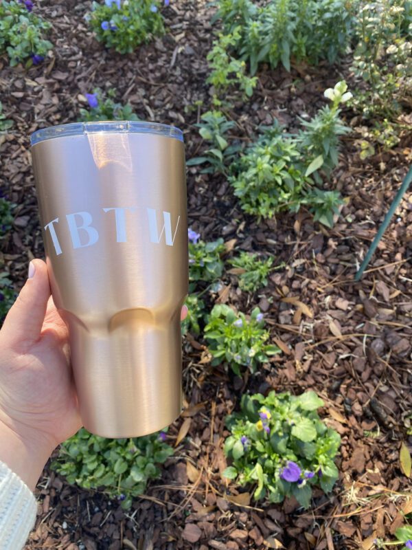 A tumbler with a TBTW label